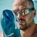 Kayenne Pro – Schwimmbrille – Erwachsene – verspiegelte silberne Titanlinse – transparent/grau